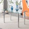 Table and chair set. 1 table and 4 black chairs. The thickness of the glass dining table top is 0.3 feet, with silver metal legs. Black PU leather bac