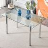 Table and chair set. 1 table and 4 black chairs. The thickness of the glass dining table top is 0.3 feet, with silver metal legs. Black PU leather bac